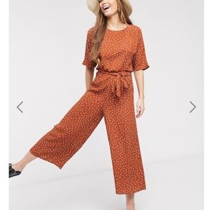 ASOS DESIGN tie waist jumpsuit in spot print